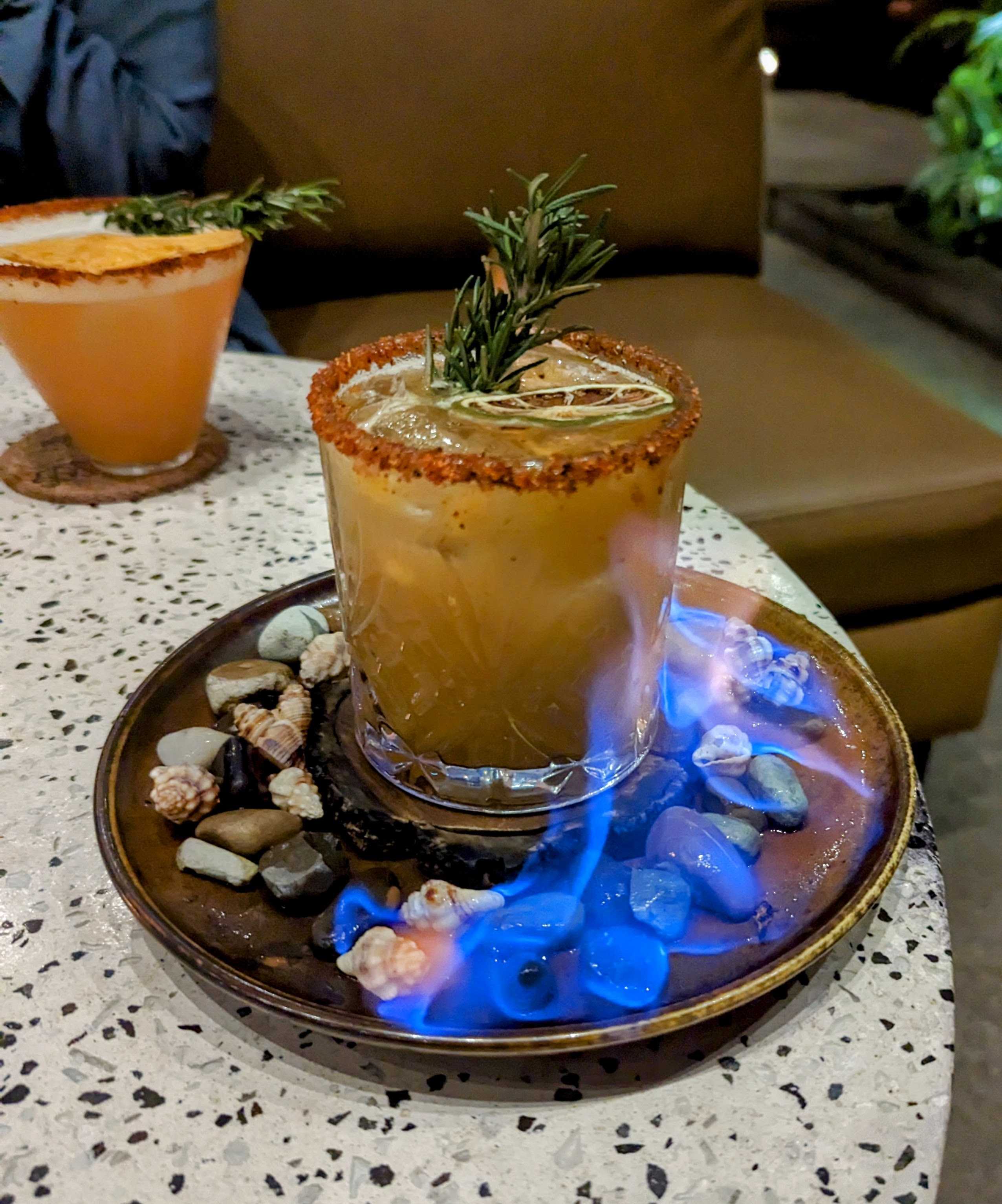 A colorful cocktail on a table